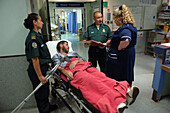 Paramedics admitting patient to hospital