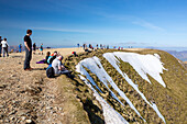 Crowds on the summit of Helvellyn, Lake District, UK