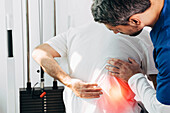 Treatment for back pain, conceptual image