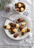 Spritz cookies with chocolate and pistachios