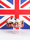 Cherry trifle in front of a British flag