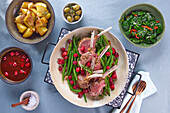 Rack of lamb with green beans and cranberries