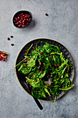 Lettuce salad with pomegranate seeds