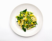 Reginelle with courgettes, herbs and saffron sauce