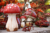 Fly agaric ornaments with tiny rose hips