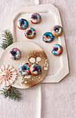 Mini Christmas donuts with colourful icing