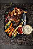 Roast Lamb with vegetables and dips