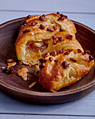 A savoury puff pastry with diced bacon
