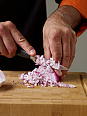 Red onion being diced