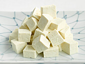A pile of diced tofu