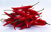 Red chilies on a white background