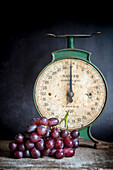 A Bunch of Grapes with a vintage Scale