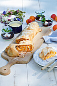 Apricot strudel with vanilla sauce and elderberry