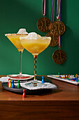 Alkoholfreier Monopoly-Cocktail mit Ingwer, Orange und Mango