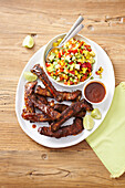 Mexican-style chilli rib, served with Smoky corn and avocado salsa