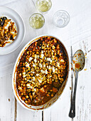 Lamb and aubergine stew with crispy chickpea topping
