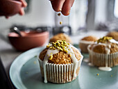 Carrot muffins sprinkled with pistachios