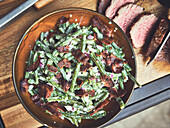 Green bean salad with bacon and rump steak