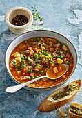 Minestrone with pesto baguette