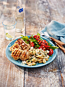 Rosemary chicken with butter bean feta salad and grilled vegetables