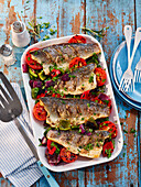 Sea bass with herbs, tomatoes, and peppers