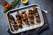 Roasted pork and red onion skewers with a rosemary, thyme and honey glaze