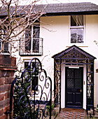 Exterior of Victorian terrace house with porch