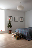 Modern bedroom with christmas tree