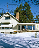 Exterior of traditionally Swedish chalet in the s0w