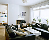 Leather furniture arranged around coffee table