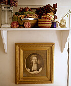 Period portrait painting and dried flowers on shelf Stockholm Sweden