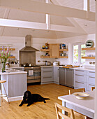 Kitchen with fitted units and breakfast bar