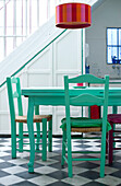 Dining table with colorful lamp above Buenos Aires, Argentina