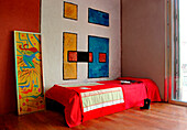 ChildØµs room with artwork by Natalia Campos and abstract geometric shapes