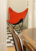 Red chair view through dining room doorway