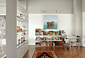 Open plan study with freestanding display cabinet and room divider