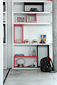 Design bookcase with iron structure painted white with MDF movable cubes and rectangles