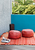 Rooftop terrace with Indian floor seating and a woven bedspread made in Salta Argentina