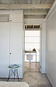 Panelled wardrobe and en-suite wash stand in bathroom