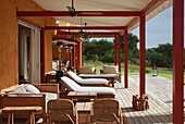 Uruguay, porch with lounge chairs