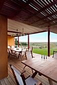 Uruguay, porch with dining table