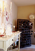 Christmas candles and wooden wine bottle rack