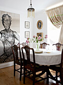 Dining room table and chairs with sculptural artwork 18th Century Georgian terrace Hampstead, London