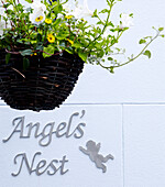 House name and hanging basket