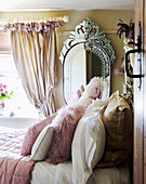 Panelled bedroom with theatrical elements