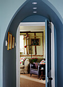 View through open doorway from hall to living room