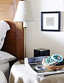 Bracelets and lamp on bedside table in Durham family home England UK