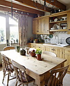 Wooden kitchen table and chairs in Hexham country house Northumberland England UK