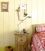 Bedside cabinet with desk lamp in Abbekerk home in the Dutch province of North Holland municipality of Medemblik