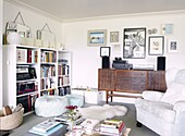 Vintage sideboard with bookcase in living room of Staffordshire home, England, UK